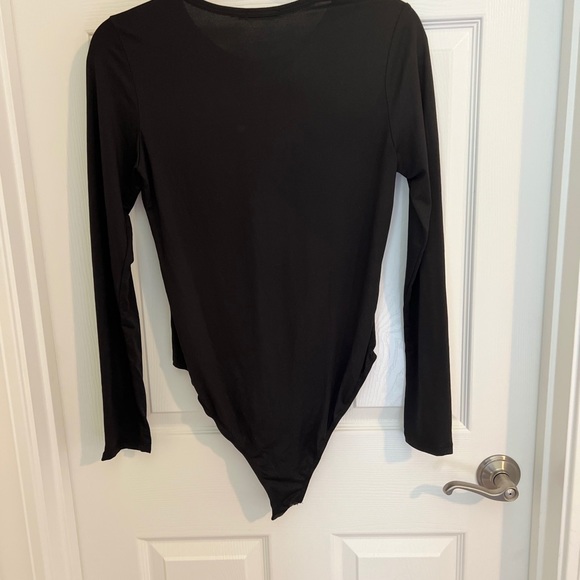 Black bodysuit in large size, never worn. - Picture 2 of 2